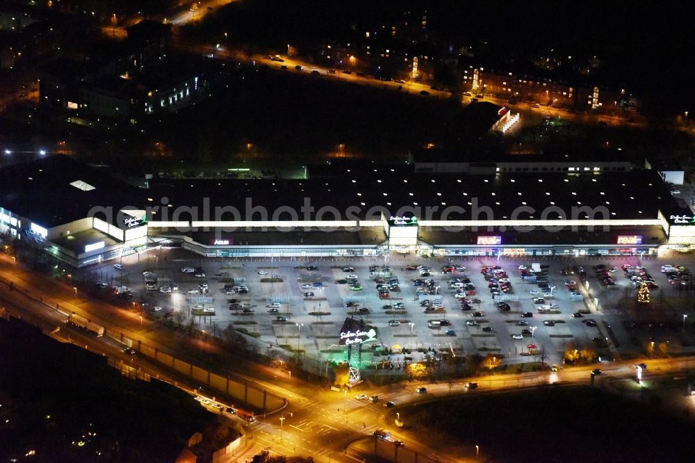 Aerial image at night Schwerin - Night view building of the shopping center seven seas centre in Schwerin in the state Mecklenburg - Western Pomerania