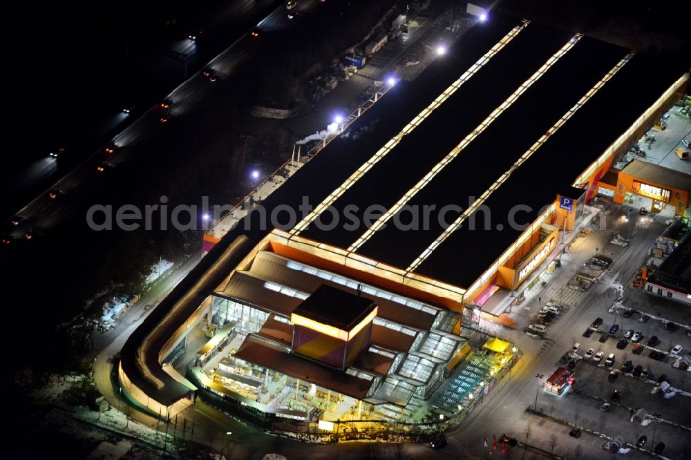 Aerial image at night München - Night aerial view from the building of the construction market HORNBACH- at the Burmester street in Munich in Bavaria