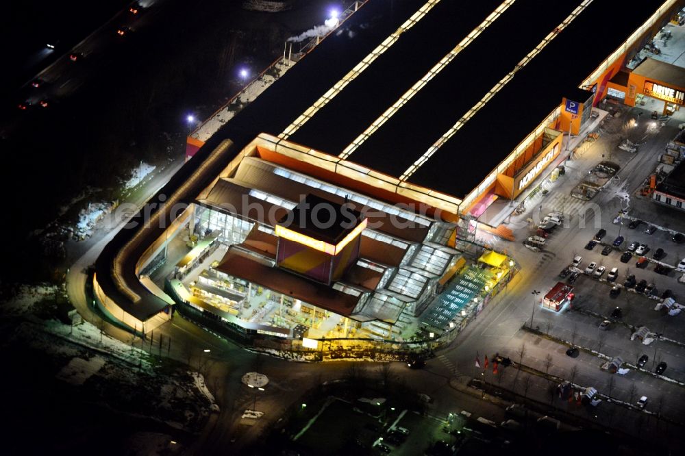 München at night from above - Night aerial view from the building of the construction market HORNBACH- at the Burmester street in Munich in Bavaria