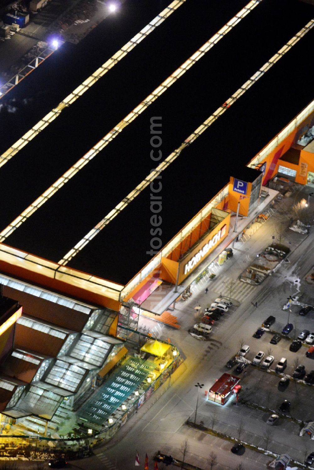 München at night from the bird perspective: Night aerial view from the building of the construction market HORNBACH- at the Burmester street in Munich in Bavaria