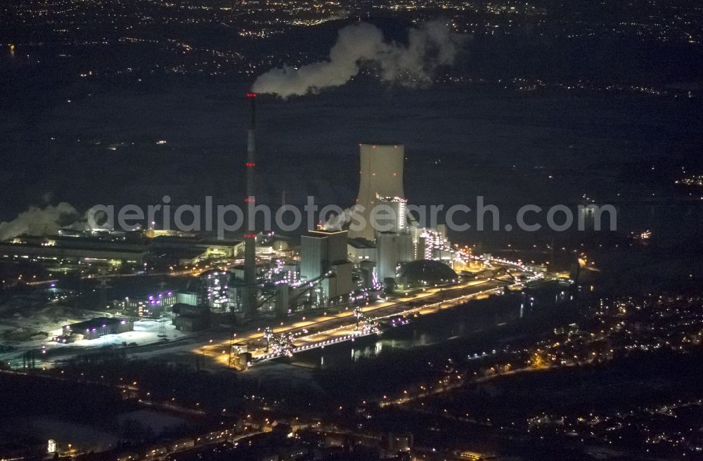 Duisburg at night from above - View at the hard coal power plant Walsum in the district Walsum in Duisburg in the federal state of North Rhine-Westphalia. It is located on the site of the former mine , which was up to its closure in 2008, the last in use mine in the city of Duisburg. Operators of the plant are the municipal utility consortium Rhine-Ruhr and Evonik Industries AG