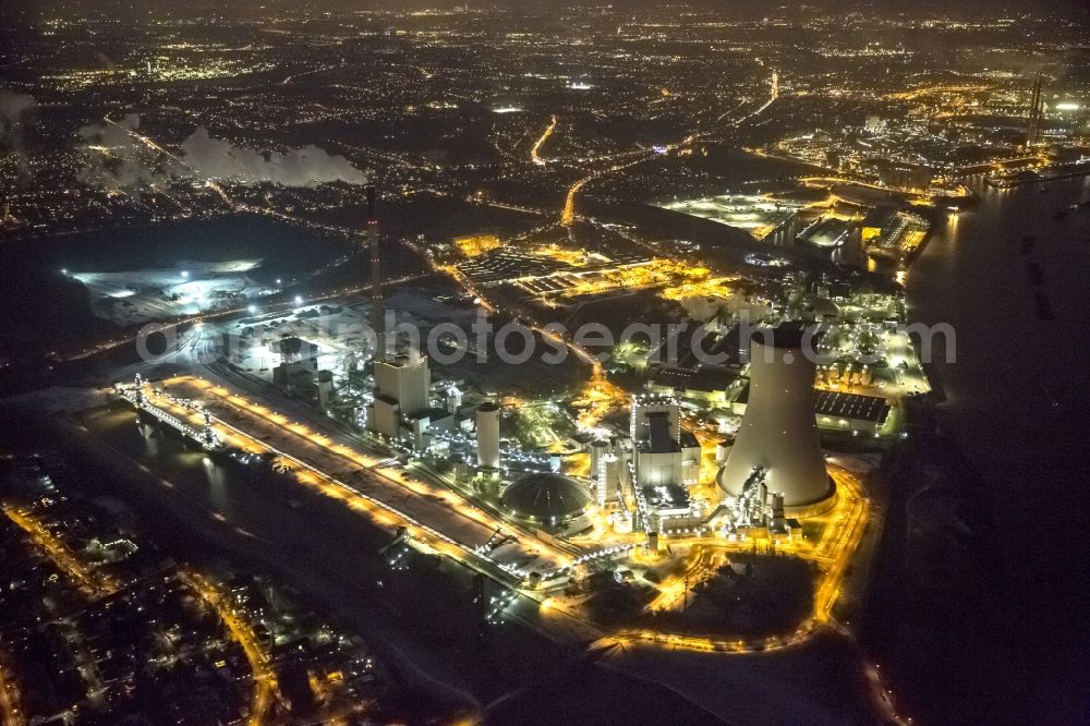 Duisburg at night from above - View at the hard coal power plant Walsum in the district Walsum in Duisburg in the federal state of North Rhine-Westphalia. It is located on the site of the former mine , which was up to its closure in 2008, the last in use mine in the city of Duisburg. Operators of the plant are the municipal utility consortium Rhine-Ruhr and Evonik Industries AG