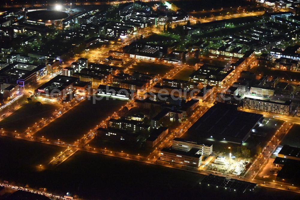 Aerial photograph at night Berlin - Night aerial view on the industrial estate and company settlement at the Rudower Chaussee in the Adlershof district of Berlin in Germany