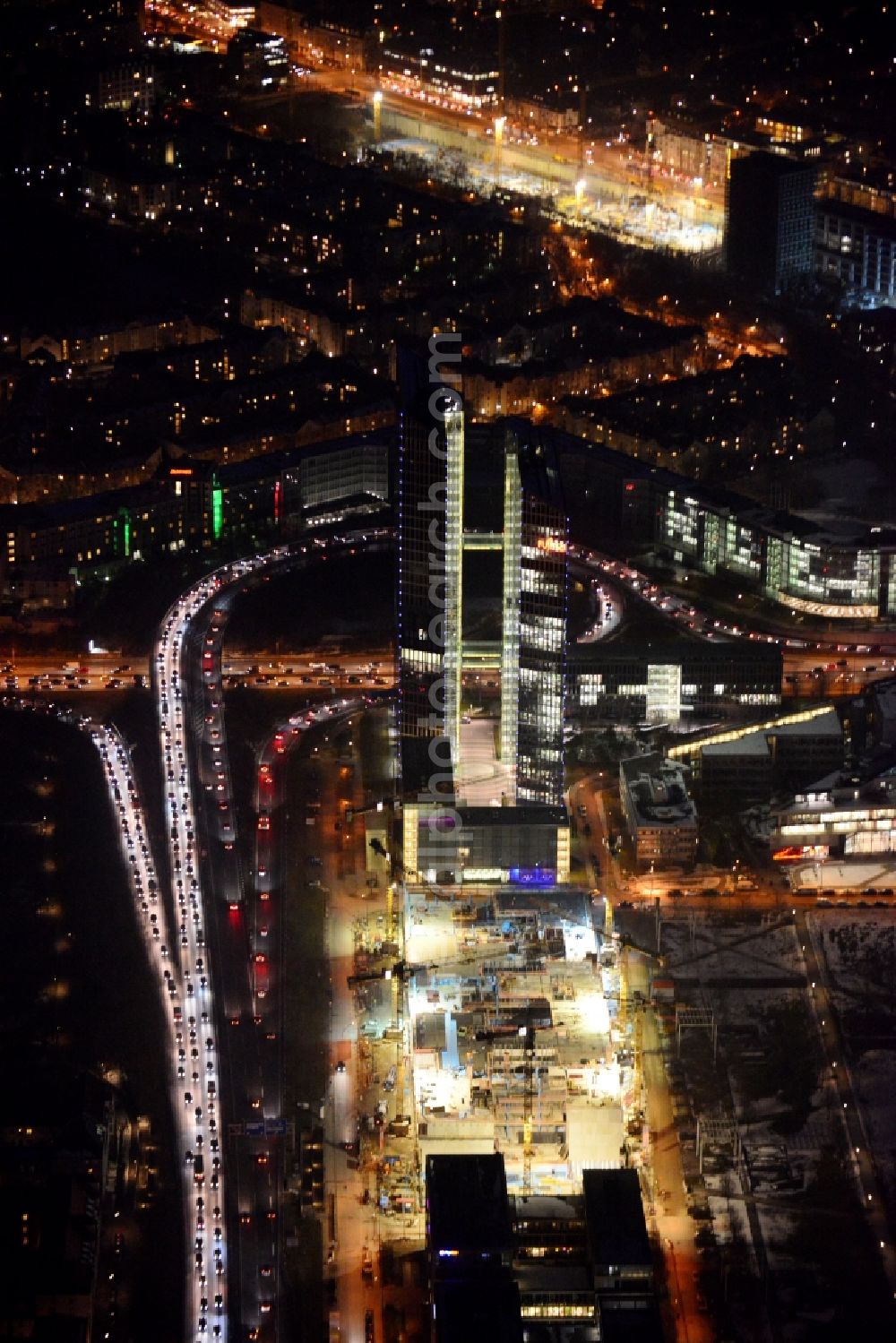 München at night from above - Night view of „ HighLight Towers “ office building in Munich