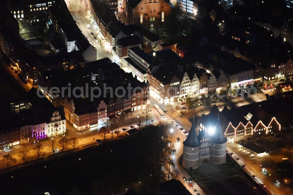 Lübeck at night from above - Night view holsten Gate in the city center of the old town - center of Luebeck in Schleswig-Holstein