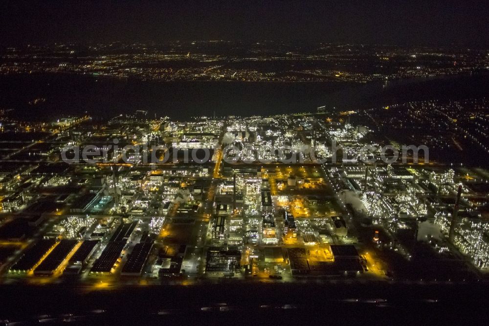 Aerial photograph at night Dormagen - Night aerial view of industrial site Chempark (formerly Bayer Dormagen or Dormagen site) in Dormagen, in North Rhine-Westphalia