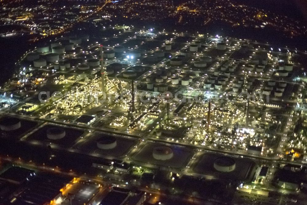 Aerial photograph at night Köln Godorf - Night aerial view of the industrial area of the German Rhineland refinery Godorf Shell AG in Cologne in North Rhine-Westphalia