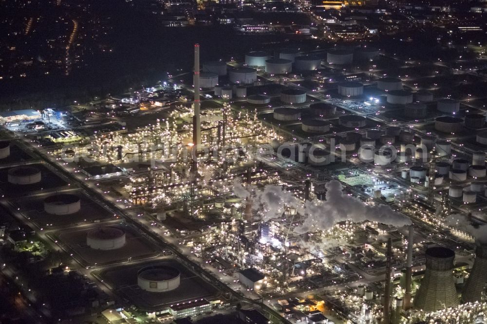 Aerial image at night Köln Godorf - Night aerial view of the industrial area of the German Rhineland refinery Godorf Shell AG in Cologne in North Rhine-Westphalia