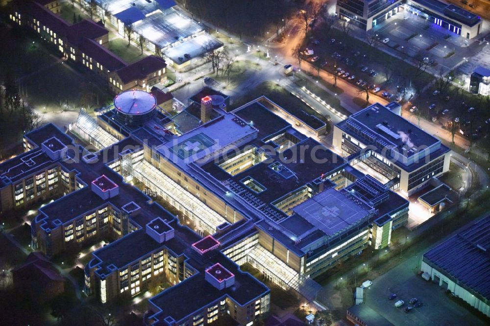 Berlin at night from the bird perspective: Night view of hospital grounds of the accident clinic in the district Marzahn-Hellersdorf in Berlin