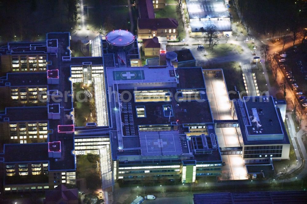 Aerial image at night Berlin - Night view of hospital grounds of the accident clinic in the district Marzahn-Hellersdorf in Berlin