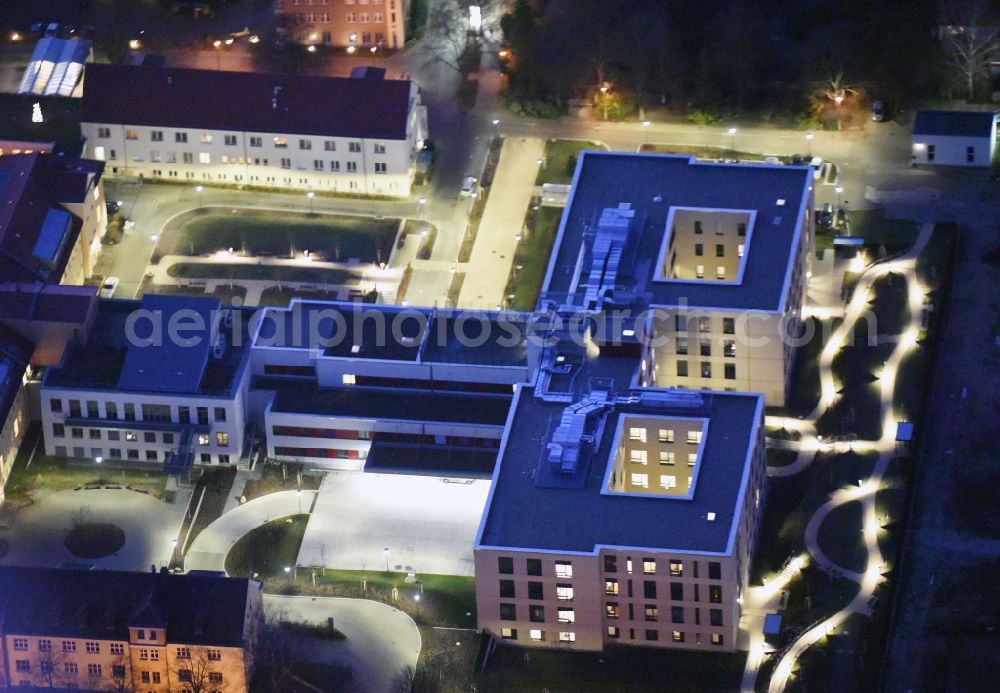 Berlin at night from the bird perspective: Night view hospital grounds of the Vivantes clinic in the district Kaulsdorf in Berlin