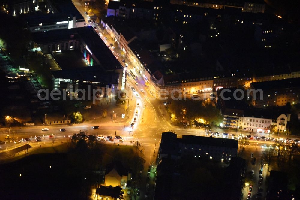 Berlin at night from above - Night aerial view of buildings on the Koellnischer Platz at the intersection between Oberspreestrasse, Gruenauer Strasse and Gutenbergstrasse near the Lange Bruecke in the Koepenick district of Berlin