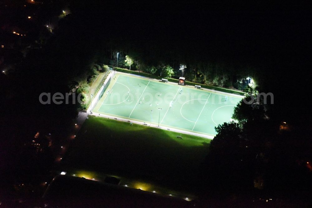 Aerial image at night Potsdam - Night view sports grounds and football pitch Sandscholle of the SV Babelsberg 03 II in the Karl-Liebknecht-Strasse in Potsdam in the state Brandenburg