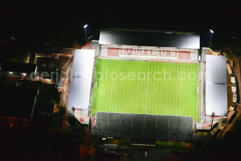 Cottbus at night from the bird perspective: Night shot of Stadium of Friendship in Cottbus. The Arena is the home ground of the football club FC Energie Cottbus