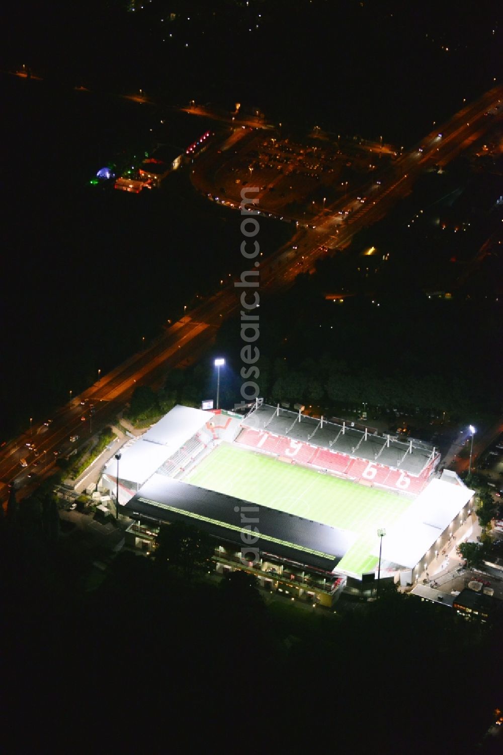 Aerial photograph at night Cottbus - Night shot of Stadium of Friendship in Cottbus. The Arena is the home ground of the football club FC Energie Cottbus