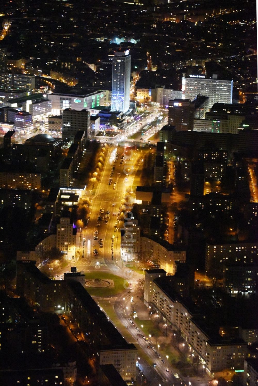 Berlin at night from above - Night view of the Strausberger Platz with fountain in the district Friedrichshain of Berlin