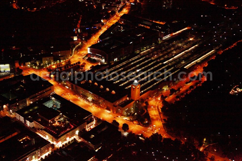 Stuttgart at night from the bird perspective: Night aerial - shot of Stuttgart Central Station. The termnal station will be largely demolished during the project Stuttgart 21 and converted into an underground transit station