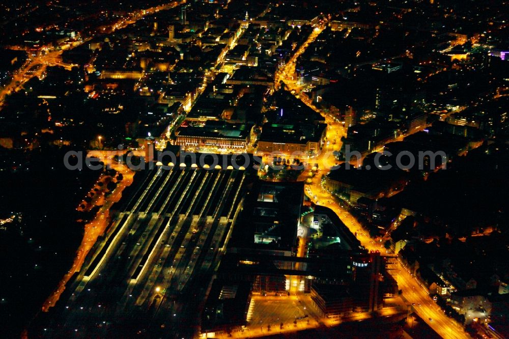 Aerial image at night Stuttgart - Night aerial - shot of Stuttgart Central Station. The termnal station will be largely demolished during the project Stuttgart 21 and converted into an underground transit station