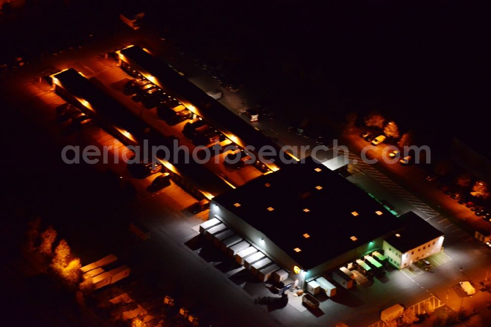 Aerial photograph at night Hoppegarten - Night aerial photo of the UPS Depot in Hoppegarten in the state Brandenburg