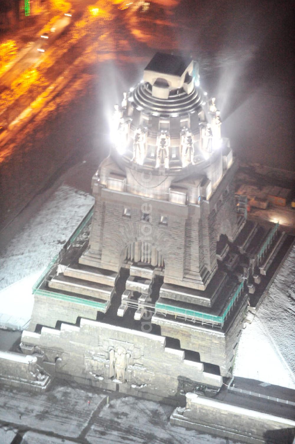 Aerial photograph at night Leipzig - Nachtluftbild vom Völkerschlachtdenkmal - winterlich mit Schnee bedeckt. Night aerial view of the Battle Monument Leipzig.