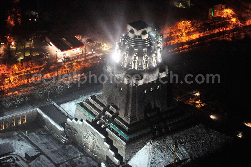 Aerial image at night Leipzig - Nachtluftbild vom Völkerschlachtdenkmal - winterlich mit Schnee bedeckt. Night aerial view of the Battle Monument Leipzig.