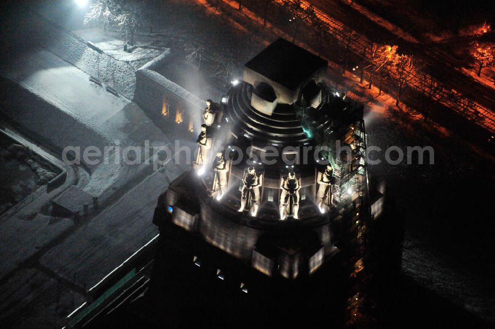 Leipzig at night from above - Nachtluftbild vom Völkerschlachtdenkmal - winterlich mit Schnee bedeckt. Night aerial view of the Battle Monument Leipzig.