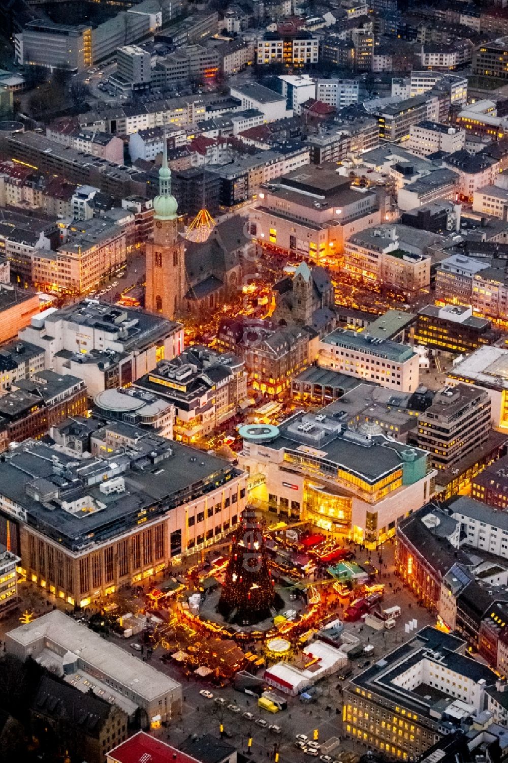 Aerial image at night Dortmund - Night aerial view from the Christmas market at the Hansa square with the big Christmas Tree in the city of Dortmund in North Rhine-Westphalia