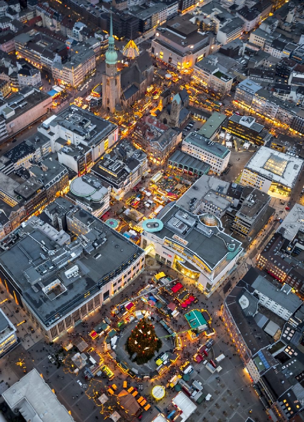 Aerial photograph at night Dortmund - Night aerial view from the Christmas market at the Hansa square with the big Christmas Tree in the city of Dortmund in North Rhine-Westphalia