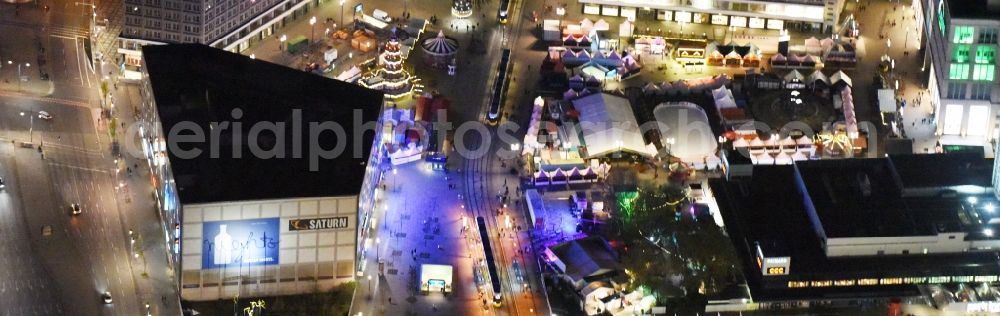 Aerial photograph at night Berlin - Night view christmassy market event grounds and sale huts and booths auf dem Alexanderplatz in Berlin