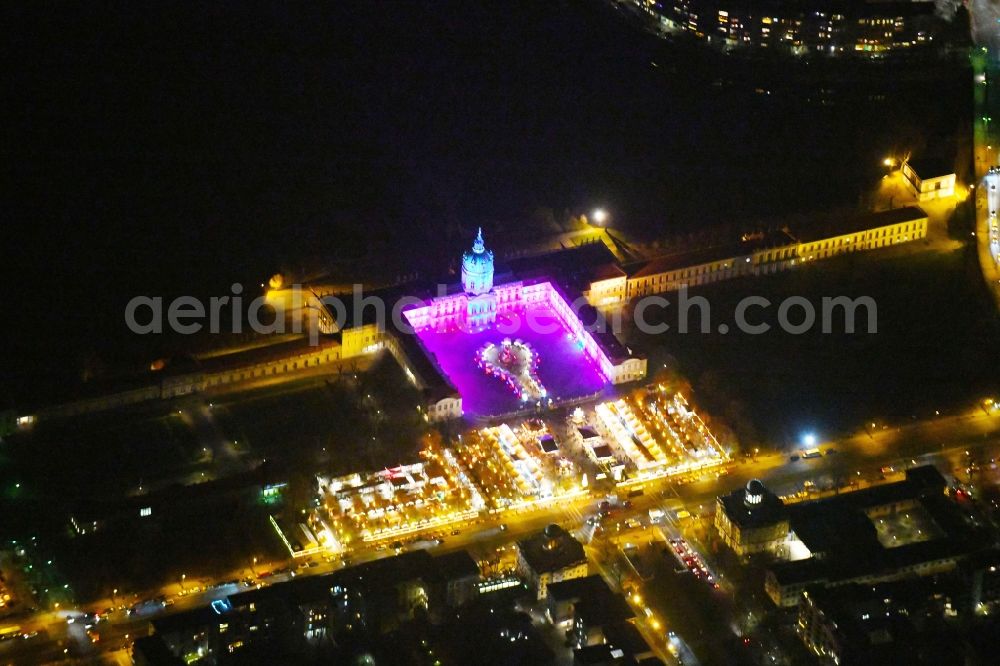 Aerial photograph at night Berlin - Night view of christmassy market event grounds and sale huts and booths am Schloss Charlotteburg in the district Bezirk Charlottenburg-Wilmersdorf in Berlin