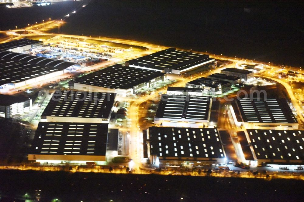 Ingolstadt at night from the bird perspective: Night view Building and production halls on the premises of AUDI AG on Ettinger Strasse in Ingolstadt in the state Bavaria