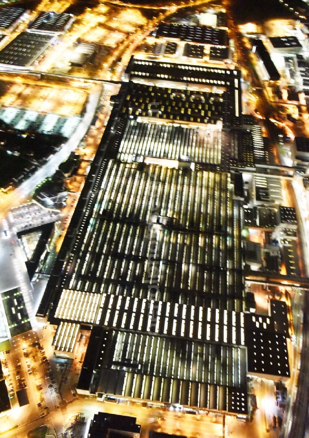 Ingolstadt at night from the bird perspective: Night view Building and production halls on the premises of AUDI AG on Ettinger Strasse in Ingolstadt in the state Bavaria