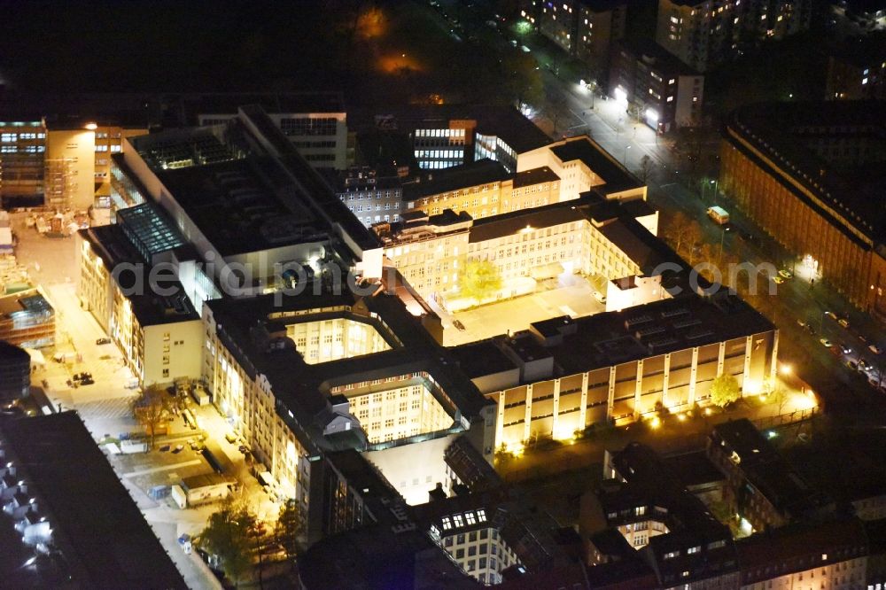 Berlin at night from the bird perspective: Night view of the building and production halls on the premises of der Bundesdruckerei in Berlin