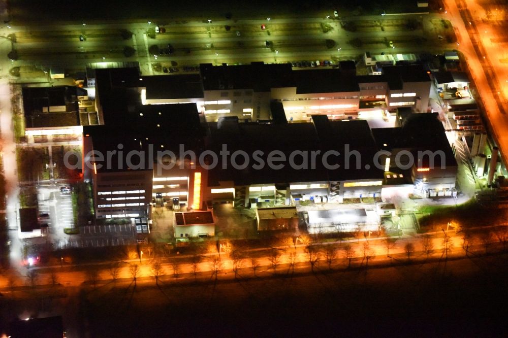 Regensburg at night from the bird perspective: Night view of factory premises of the company OSRAM Opto Semiconductors GmbH in Regensburg in the state Bavaria