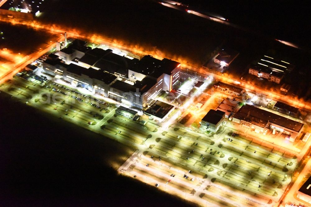 Regensburg at night from the bird perspective: Night view of factory premises of the company OSRAM Opto Semiconductors GmbH in Regensburg in the state Bavaria