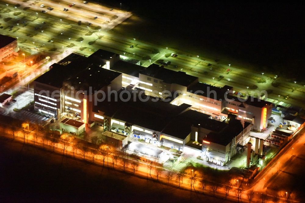 Regensburg at night from the bird perspective: Night view of factory premises of the company OSRAM Opto Semiconductors GmbH in Regensburg in the state Bavaria