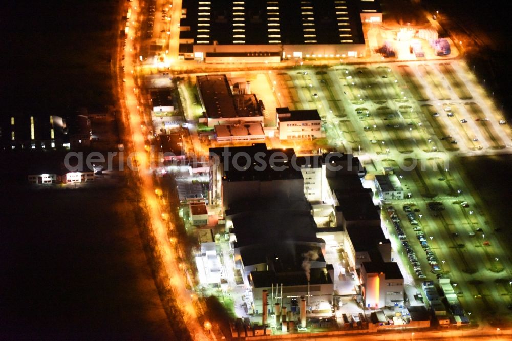 Regensburg at night from the bird perspective: Night view of factory premises of the company OSRAM Opto Semiconductors GmbH in Regensburg in the state Bavaria