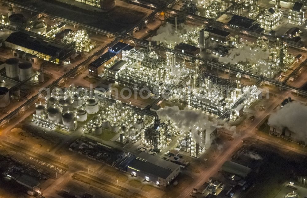 Marl at night from the bird perspective: Night Aerial view of the facilities of the Marl Chemical Park (formerly Chemische Werke Huls AG) in the Ruhr area in North Rhine-Westphalia