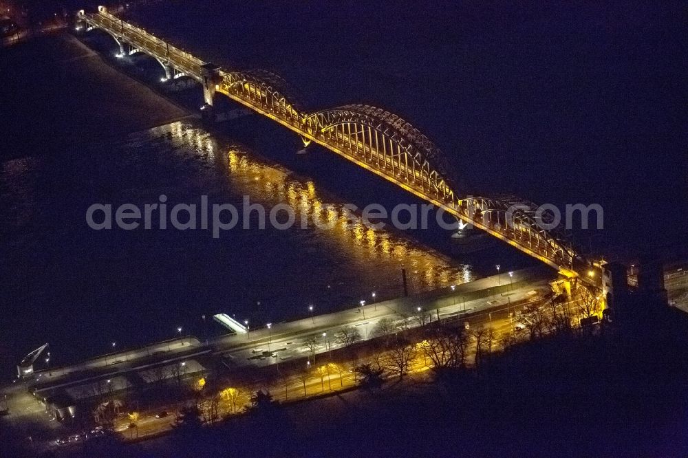 Aerial image at night KÖLN - Night aerial view of the arches of the South Bridge of the Rhine bridges over the Rhine in Cologne, in the state of North Rhine-Westphalia