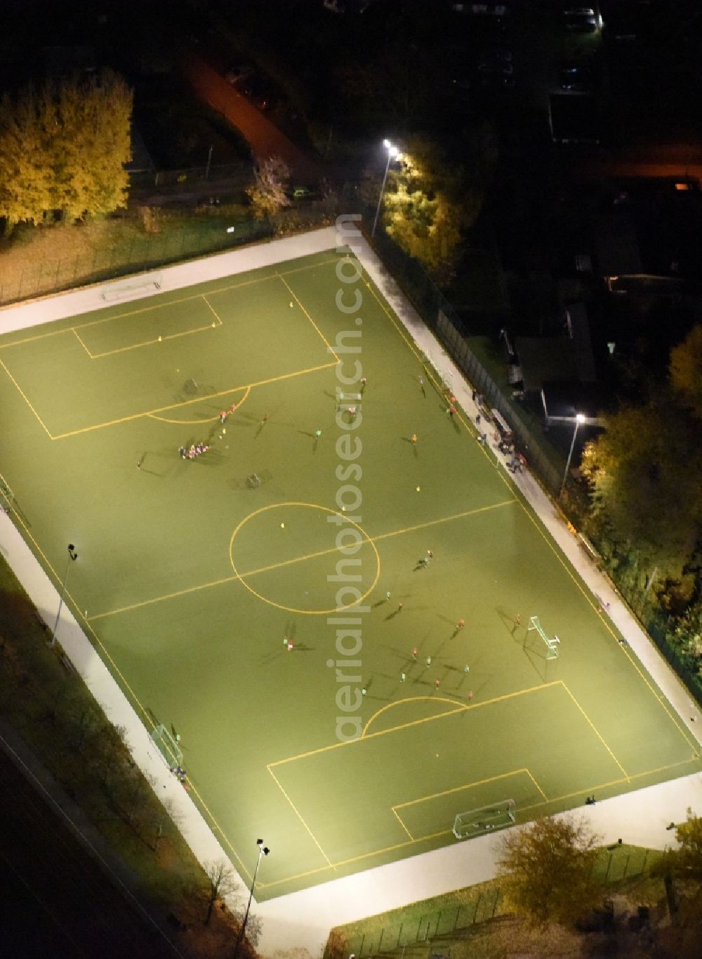 Aerial image at night Berlin - Night aerial view on the soccer field of the Koepenicker-SC e.V. in the Koepenick district of Berlin