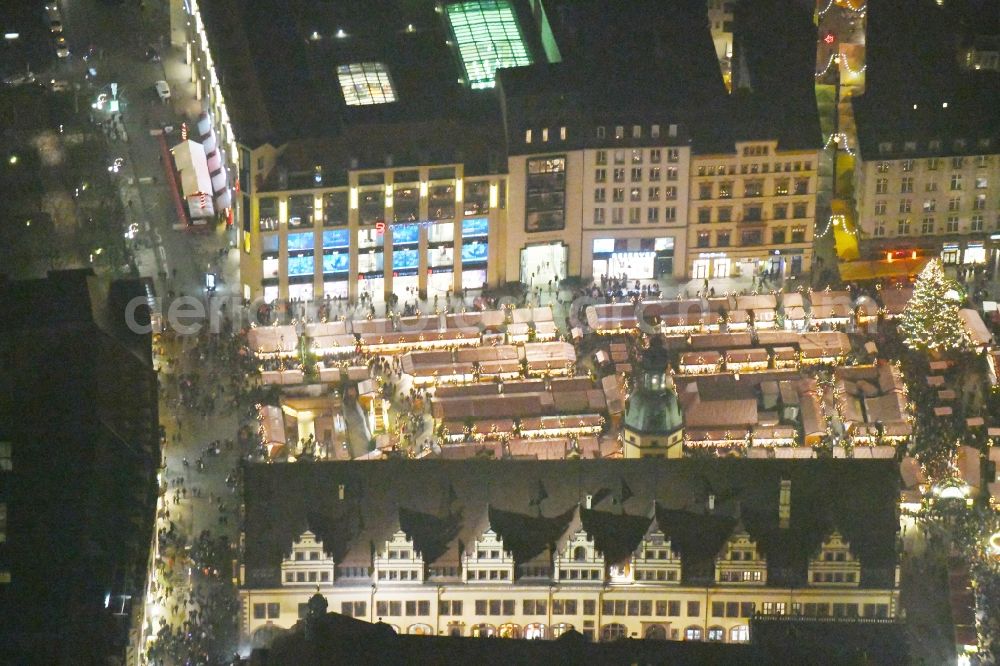 Aerial image at night Leipzig - Night lighting christmas market on Town Hall building of the City Council at the market downtown in the district Zentrum in Leipzig in the state Saxony, Germany