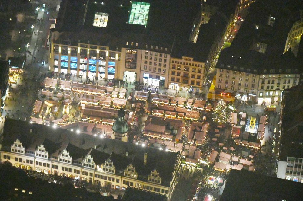 Aerial photograph at night Leipzig - Night lighting christmas market on Town Hall building of the City Council at the market downtown in the district Zentrum in Leipzig in the state Saxony, Germany