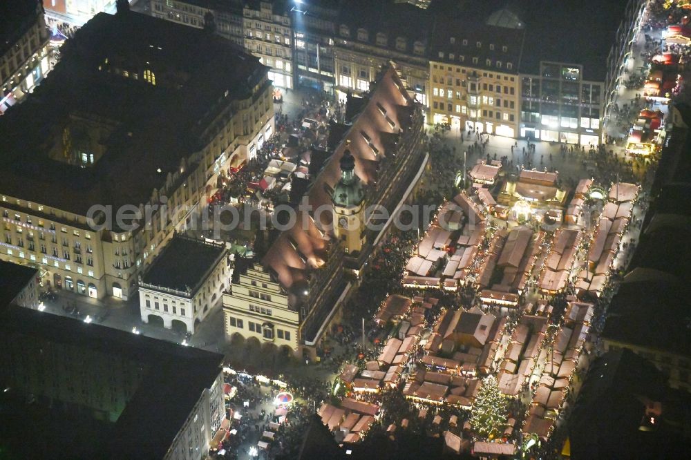 Aerial image at night Leipzig - Night lighting christmas market on Town Hall building of the City Council at the market downtown in the district Zentrum in Leipzig in the state Saxony, Germany