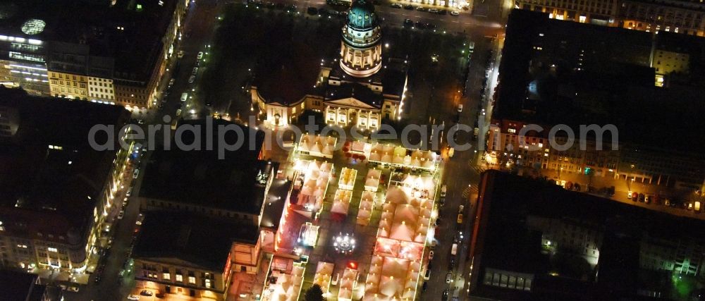 Aerial photograph at night Berlin - Night view christmas market on place area Gendarmenmarkt with the building ensemble German and French Cathedral, Schauspielhaus in Berlin Mitte