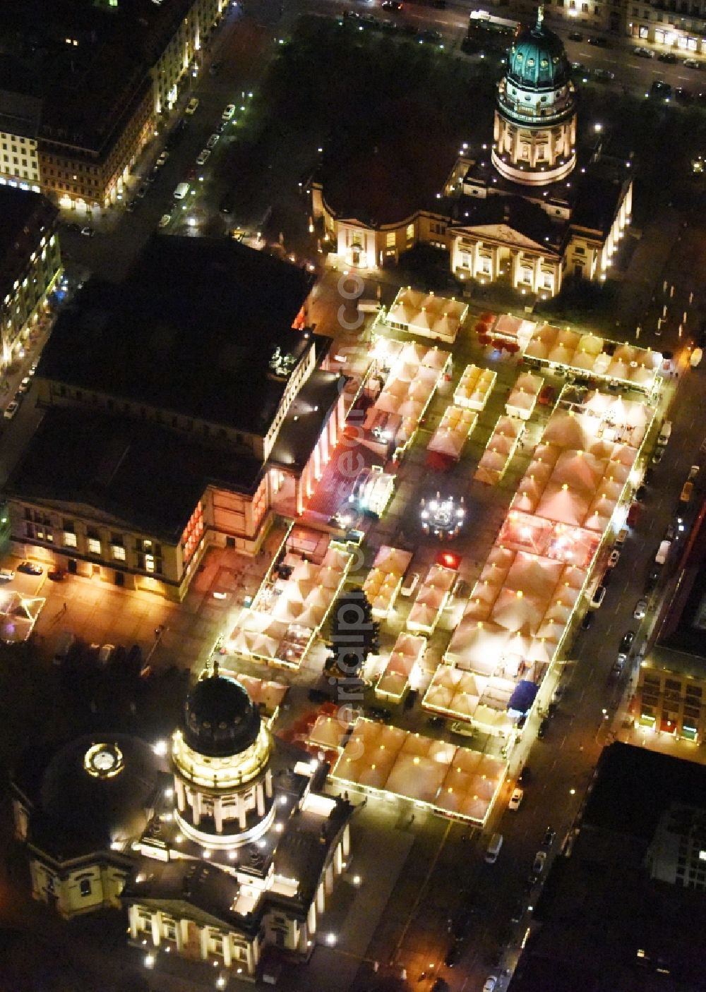 Aerial image at night Berlin - Night view christmas market on place area Gendarmenmarkt with the building ensemble German and French Cathedral, Schauspielhaus in Berlin Mitte