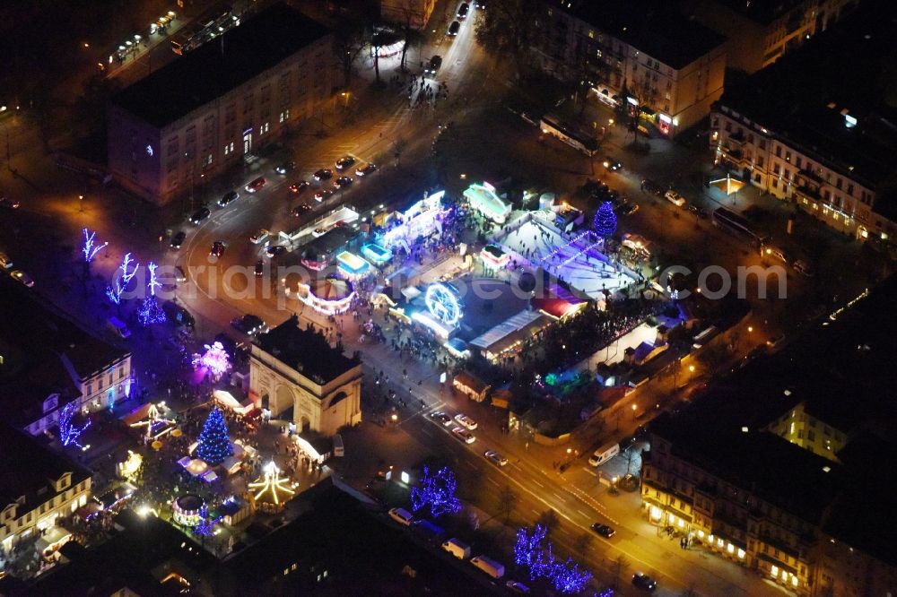 Aerial image at night Potsdam - Night lights of Christmas - event site Luisenplatz on place Brandenburger Tor in Potsdam in the state Brandenburg