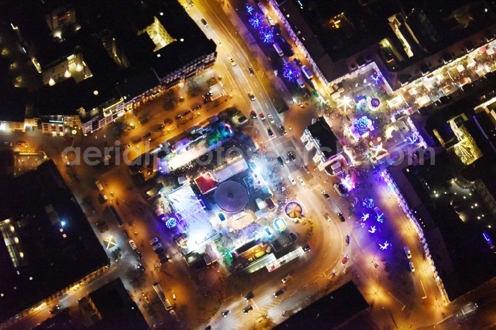 Aerial image at night Potsdam - Night lights of Christmas - event site Luisenplatz on place Brandenburger Tor in Potsdam in the state Brandenburg