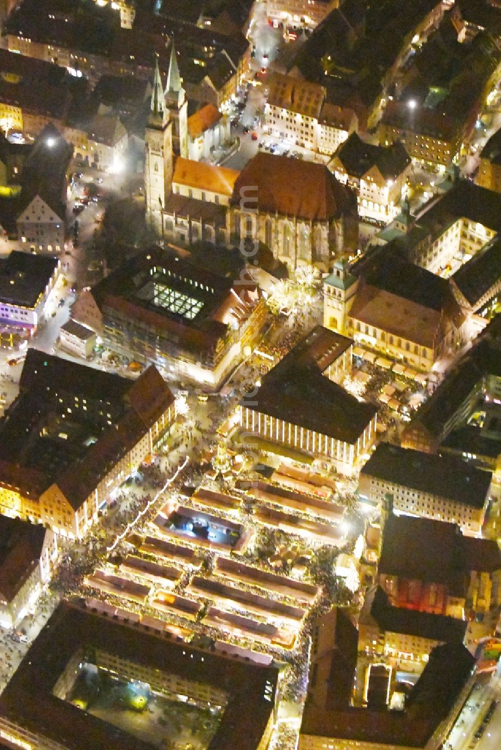 Aerial photograph at night Nürnberg - Night lighting Christmassy market event grounds and sale huts and booths on Platz of Nuernberger Hauptmarkt in Nuremberg in the state Bavaria, Germany