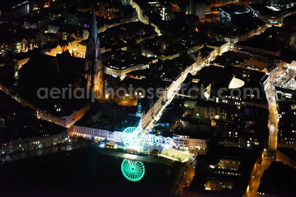 Schwerin at night from above - Night view christmas - event site at the cathedral near the Friedrichstrasse and the Pfaffenteich in Schwerin in the state Mecklenburg - Western Pomerania