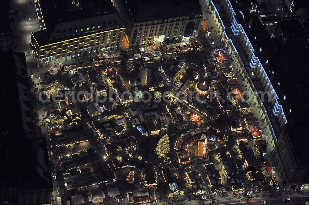 Aerial image at night Dresden - Night lighting christmassy market event grounds and sale huts and booths Dresdner Striezelmarkt in the district Zentrum in Dresden in the state Saxony, Germany